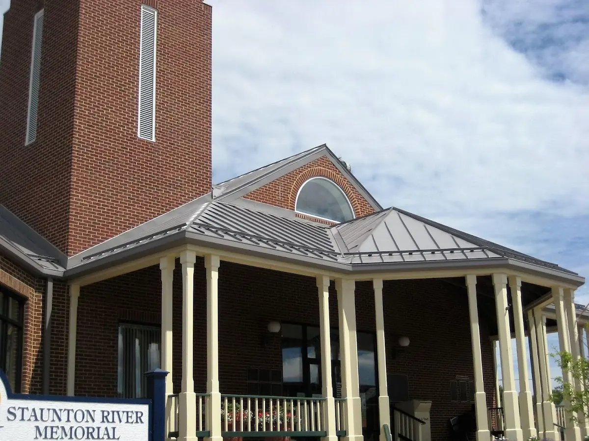 Skilled roofing craftsmen working on a residential roof in Lewisdale